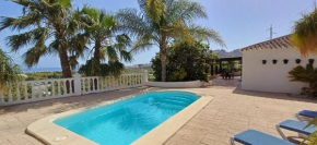 Encantador Cortijo con Piscina Privada y Vista al Mar